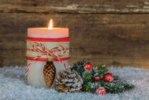 Burning candle with decoration for Advent or Christmas by Alex Winter