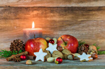 Xmas decoration with candlelight, christmas cookies, apples and nuts by Alex Winter