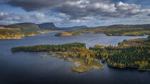 Wild landscape with lake and mountains in autumn in Lapland in Sweden from above by Bastian Linder