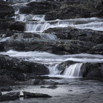 Trappstegsforsen waterfall along the Wilderness Road in Lapland in Sweden by Bastian Linder