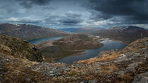 Turquoise and blue lakes in mountain landscape from above the hike to Knutshoe summit in Jotunheimen National Park in Norway by Bastian Linder