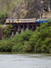 Train Along Cliff Over River by James Menges