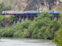 Train Along Cliff Over River by James Menges