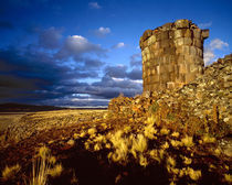 South America, Peru, near Lake Titicaca. Ancient Inca tomb at sunset. Credit as von Danita Delimont