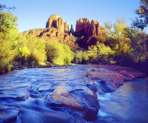 USA, Arizona,  Sedona.  Cathedral Rock reflecting in Oak Creek.  Credit as von Danita Delimont