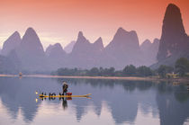 China, Li River. Single cormorant fisherman. by Danita Delimont