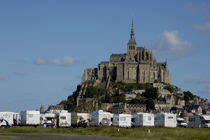 Campervans parked beneath Mont Saint-Michel, France. by Sami Sarkis Photography