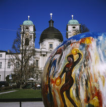 Painted sphere in front of a church, Dreifaltigkeitskirche II, Salzburg, Austria von Panoramic Images