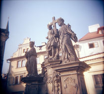 Low angle view of statues, Charles Bridge, Prague, Czech Republic by Panoramic Images