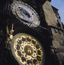 Low angle view of an astronomical clock on a government building by Panoramic Images