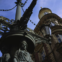 Low angle view of a statue in front of a building, Prague, Czech Republic by Panoramic Images