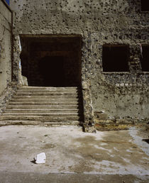 Wall and the doorway of a building with bullet holes, Syria by Panoramic Images