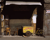 Vending cart in front of a closed store, Egypt by Panoramic Images