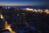 Buildings lit up at dusk, Montevideo, Uruguay von Panoramic Images
