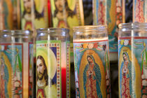 Close-up of Jesus Christ and Virgin Mary on candle holders von Panoramic Images