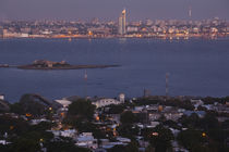 Buildings lit up at dusk, Cerro De Montevideo, Montevideo, Uruguay by Panoramic Images