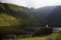 Young Woman Meditating by Panoramic Images