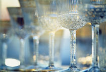 Close-up of wine glasses in a row, Berlin, Germany by Panoramic Images