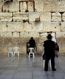 Three men praying in front of a wall, Western Wall, Old City, Jerusalem, Israel von Panoramic Images