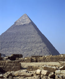 Ruins of a building in front of a pyramid, Great Pyramid, Giza, Egypt by Panoramic Images