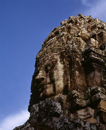 Low angle view of a face carving, Angkor Wat, Cambodia by Panoramic Images