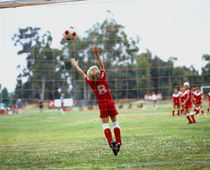 Children Playing Soccer von Panoramic Images