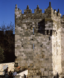 Four people near a stone wall, Wailing Wall, Jerusalem, Israel by Panoramic Images