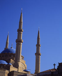 Low angle view of a church and a mosque by Panoramic Images