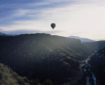 Silhouette of a hot air balloon in the sky, Taos County, New Mexico, USA by Panoramic Images