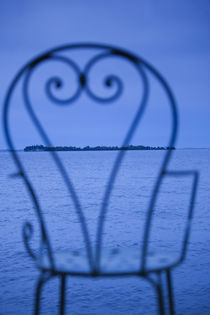 Small island viewed through a chair von Panoramic Images