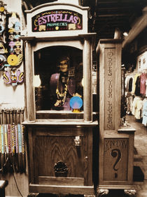 Fortune teller machine in a store by Panoramic Images