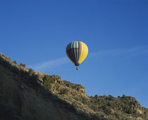 Low angle view of a hot air balloon in the sky, Taos County, New Mexico, USA von Panoramic Images