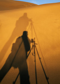Photographer's Shadow On Sand Dunes by Panoramic Images