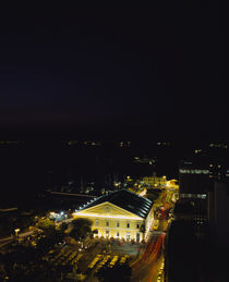 High angle view of a building lit up at night by Panoramic Images
