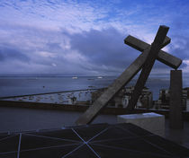Cross sculpture on the top of a building, Salvador, Brazil von Panoramic Images