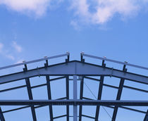 Low angle view of a steel framework for a warehouse under construction, USA by Panoramic Images