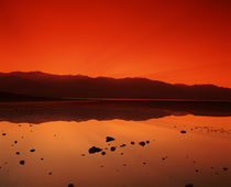Reflection of mountains in water, Badwater, Death Valley, California, USA von Panoramic Images