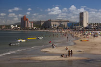 Tourists enjoying on the beach, Playa Piriapolis, Piriapolis, Maldonado, Uruguay by Panoramic Images