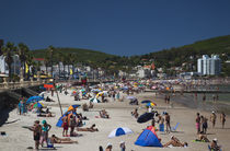 Tourists on the beach, Playa Piriapolis, Piriapolis, Maldonado, Uruguay by Panoramic Images