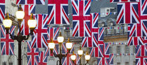 UK. London. Regent Street. Union Jack decorations for Royal Wedding. by Alan Copson