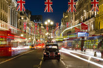 UK. London. Regent Street. Union Jack decorations for Royal Wedding. by Alan Copson