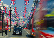 UK. London. Regent Street. Union Jack decorations for Royal Wedding. by Alan Copson