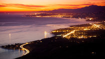 Rincon Point - evening lights. by Sean Davey