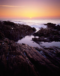 Sunset at Westward Ho!, Devon, England. by Craig Joiner