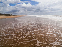 Beach landscape with foam pattern on receding wave by Yolande  van Niekerk