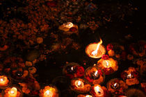 Lamps in the Ganges-2  Varanasi,India by Soumen Nath