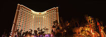 Low angle view of a hotel lit up at night, The Strip, Las Vegas, Nevada, USA by Panoramic Images