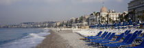Empty lounge chairs on the beach, Nice, French Riviera, France von Panoramic Images