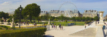 Tourists in a garden, Jardin de Tuileries, Paris, Ile-de-France, France by Panoramic Images