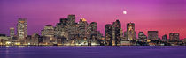 USA, Massachusetts, Boston, View of an urban skyline by the shore at night by Panoramic Images